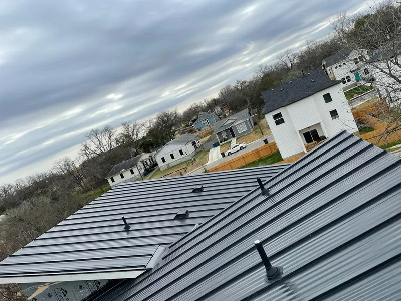 Standing seam metal roof panels with vents for Skylight Repair in Hope Mills